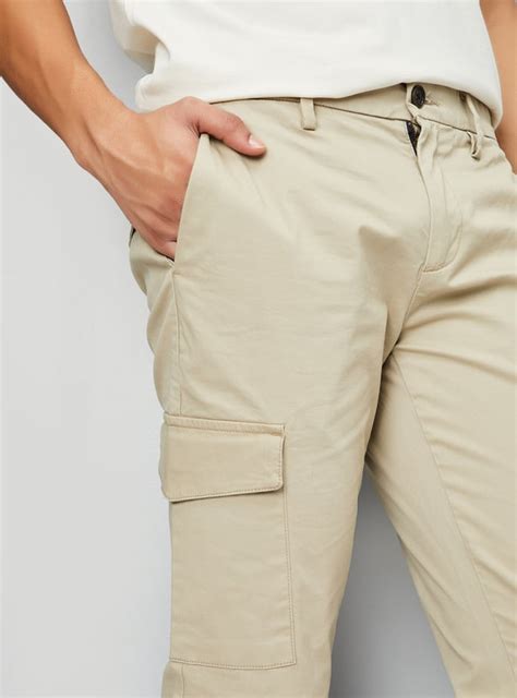 Buy Men Solid Slim Fit Cargo Trousers Online at just Rs. 1499.0 ...