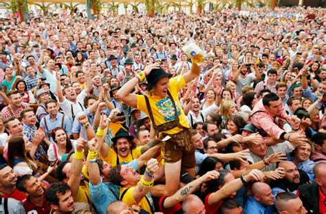 Drink it to that! Beer mania topples Munich as Oktoberfest kicks off in ...