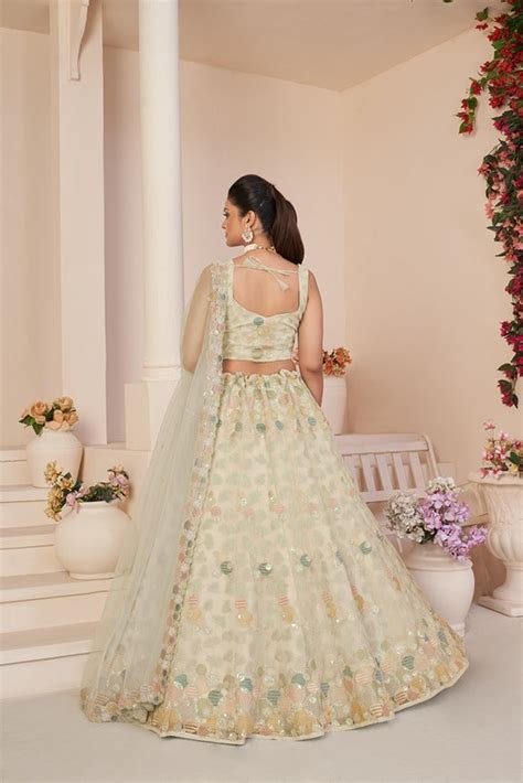 Mesmerizing White Net Lehenga Choli with Multicolor Thread