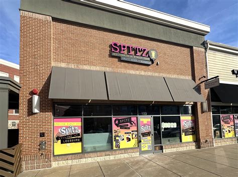 Signs of life at Spitz in Leesburg as sign is installed