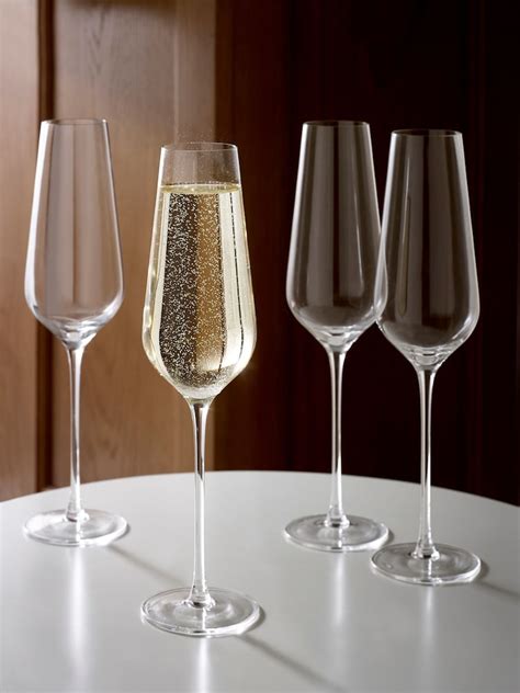 Buy Set of 4 Clear Belgravia Crystal Flute Glasses from Next India