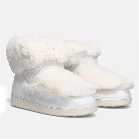 Love Moschino white snow boot with red heart and faux fur