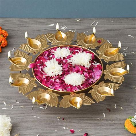 Buy eCraftIndia Golden Metal Handcrafted Traditional Designer Urli with ...