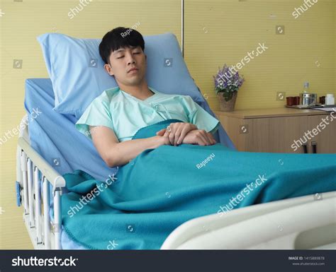 Sick Person In Hospital Bed