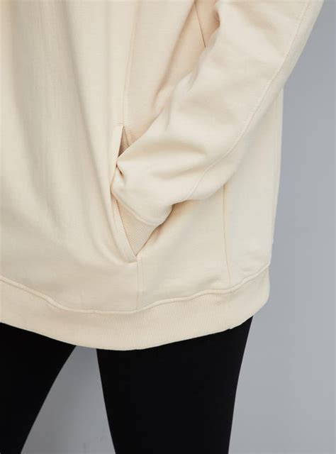 Buy Women Solid Hooded Sweatshirt Online at just Rs. 899.0 ...