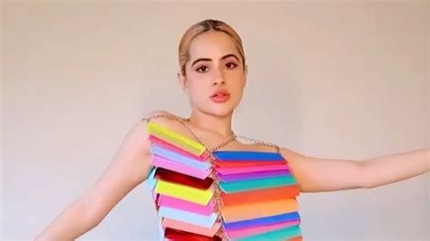 Urfi Javed slips into a BOLD dress made from combs; fans say, ‘Combing ...