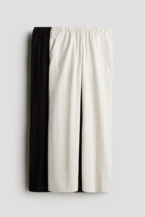 2-pack wide leg trousers - Black/Beige striped - Kids | H&M IN