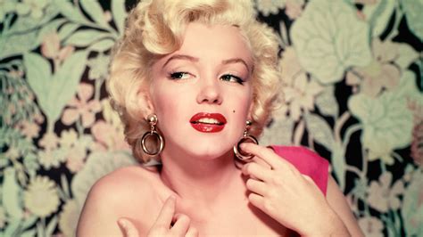 Marilyn Monroe Is Having Hand On Earring Wearing Pink Dress In Leaves ...