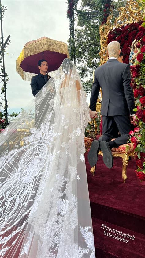 Kourtney Kardashian wears Dolce & Gabbana wedding dress to marry Travis ...