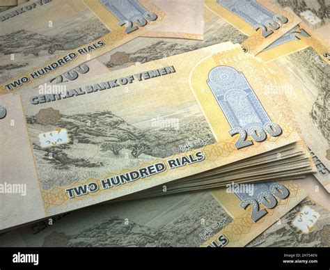Money of Yemen. Rial bills. YER banknotes. 200 Arabic. Business, finance, news background. 3d ...