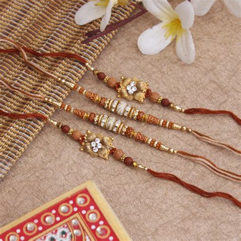 Send Elegant Set of 4 Beaded Rakhis Online - RKH19-86750 | Giftalove