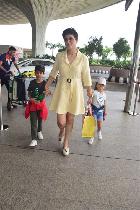 Tahira Kashyap looks radiant in yellow dress with kids Virajveer and ...