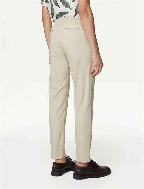 Buy Tapered Fit Elasticated Waist Trousers at Marks & Spencer