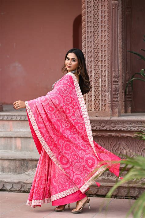 PINK CIRCLES OF THE LIFE BANDHANI SILK SAREE WITH MIRROR WORK AND LACE ...