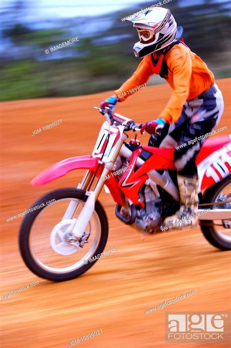 Young man motocross over field, Stock Photo, Picture And Royalty Free ...