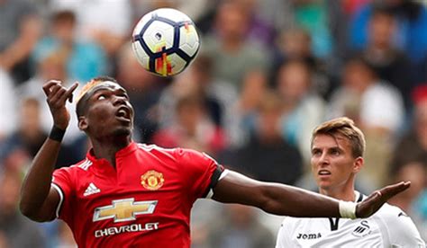 Manchester United rout Swansea with flurry of late goals