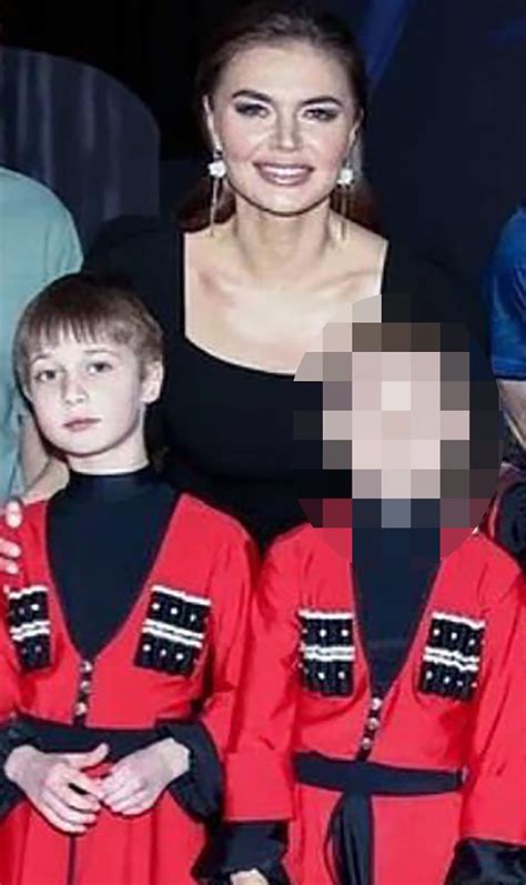 New pics show Putin’s ‘secret son’ Ivan, 10, looking identical to despot as he follows in glam ...