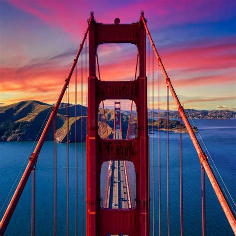 Download wallpaper 3415x3415 bridge, road, mountains, sunset ipad pro ...