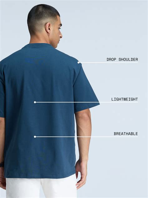 Steel Blue Solid Oversized Tee - Men – CAVA Athleisure Pvt Ltd