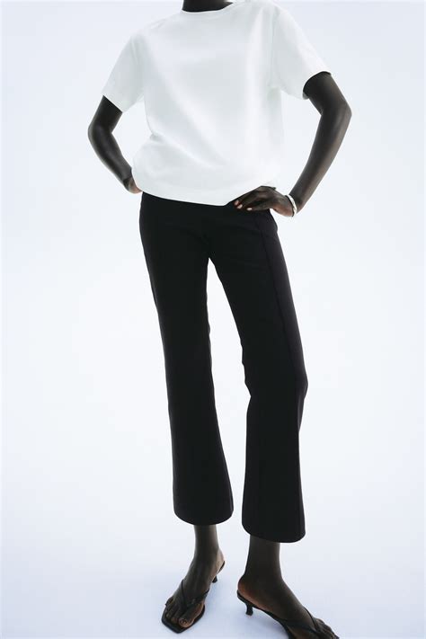 Women's Black Flared crease-front trousers | H&M IN