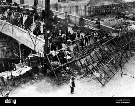 China: A barricade hastily erected by the British at the Shanghai International Settlement ...