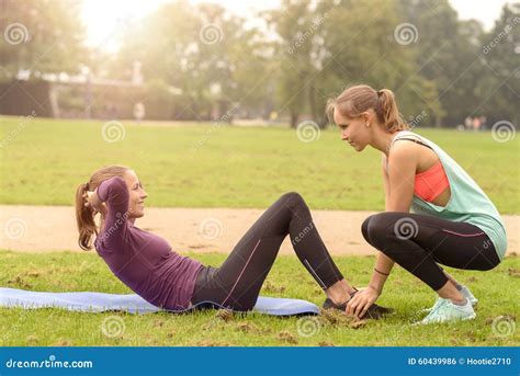 Happy Woman Doing Curl Up Exercise Stock Photo - Image of fitness ...