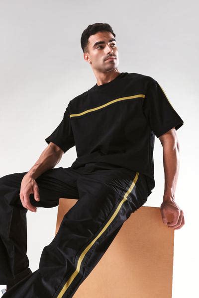 Rare Rabbit Men's Newnon Black Cotton Plain Baggy Fit Track Pant