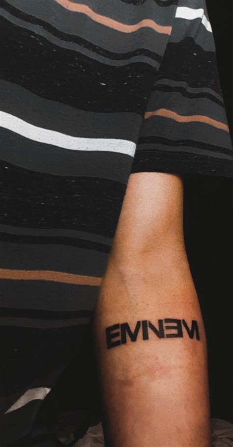 Eminem Symbol Tattoos Eminem Tattoos Pictures And Explanations