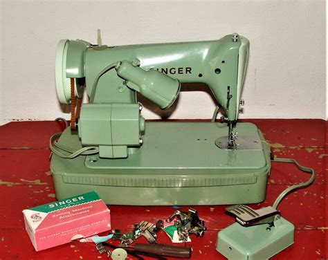 Image result for How to Operate a Singer Sewing Machine Rfj 12 8
