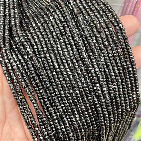 มณีใต้น้ำ (สีดำ) QUARTZ ทรงล้อรถ 3x2 mm เจียเหลี่ยมเหลี่ยม เส้นยาว ...