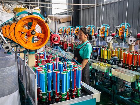 China's factory output surpasses expectations despite tariff pressures