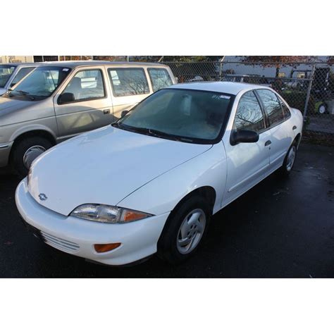 1997 WHITE CHEVY CAVALIER 4 DR SDN 88,768KM GAS