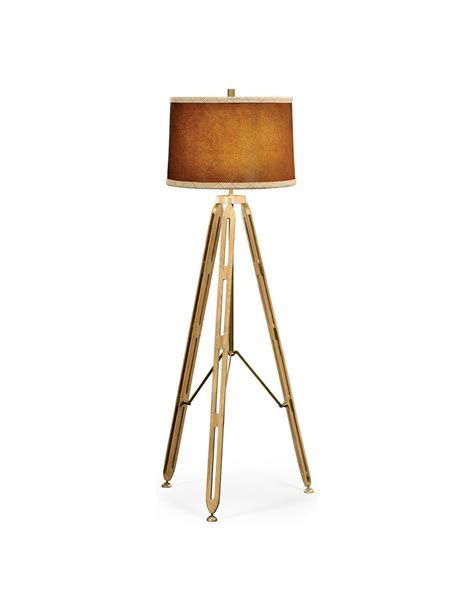 Three legged brass floor lamp
