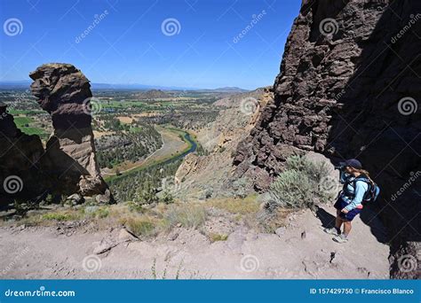 Woman on Misery Ridge Trail in Smith Rock State Park, Oregon. Stock ...