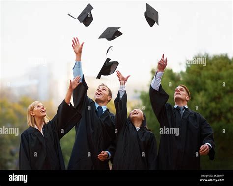 College Graduation Hats In The Air