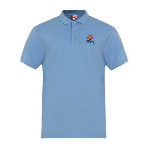 Buy Men Blue Solid Polo Polos Online at The Collective - 864778