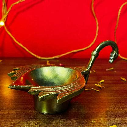 PITTALAM Brass Lotus Aarti Diya with Handle - Subtle Radiance – Pittalam