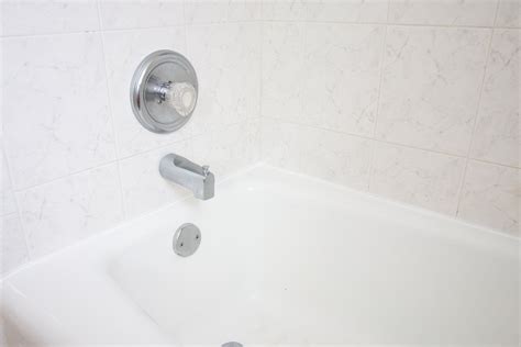 How to Recaulk a Bathtub, Step-by-Step | The DIY Playbook