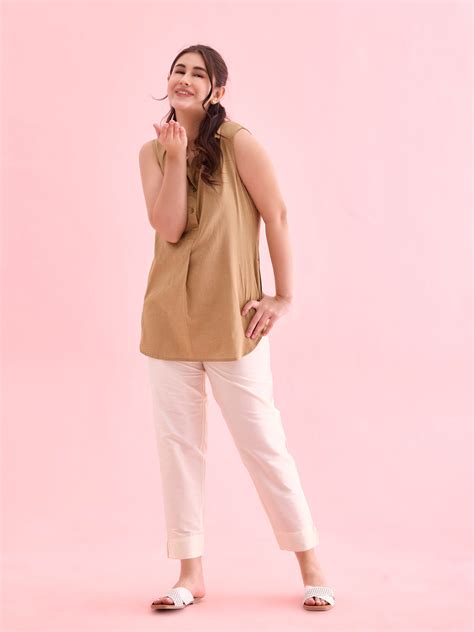 Women Cream Solid Mid Rise Metallic Pants