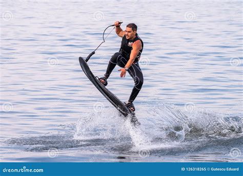 Athletic Man on Water Boarding - Sports in the Summer Having Fun on the ...