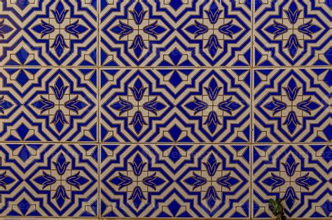 background of white-blue ceramic tiles with classic spanish patterns ...