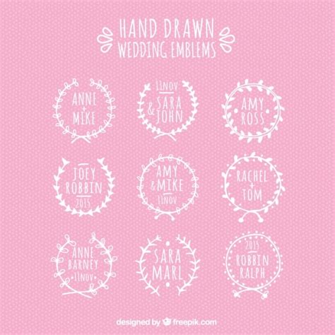 De hand getekend bruiloft emblemen | Gratis Vector