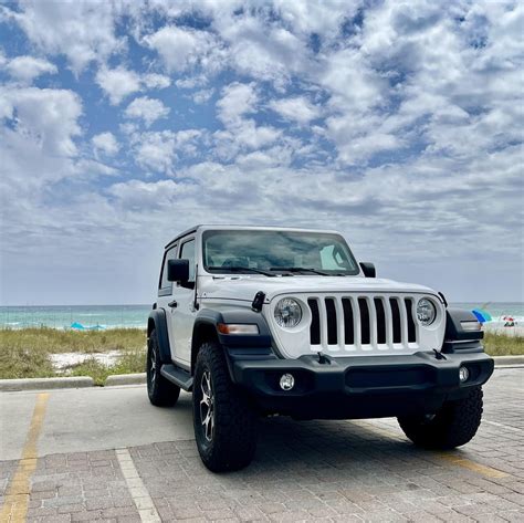 19’ JL. 13K miles. First time at the beach. The pic feels like the ...