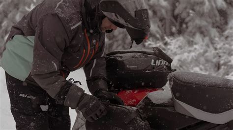 Rider going at high speed on a 2027 Ski-Doo Renegade snowmobile