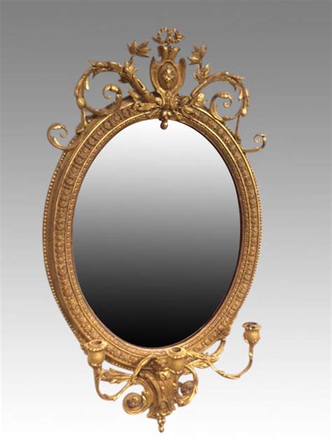 Antique oval gilt mirror.