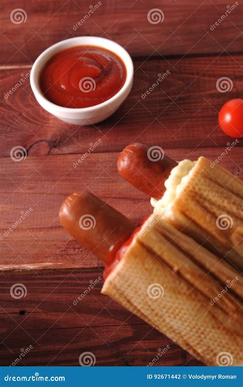 Two hot dogs with ketchup stock photo. Image of nutrition - 92671442
