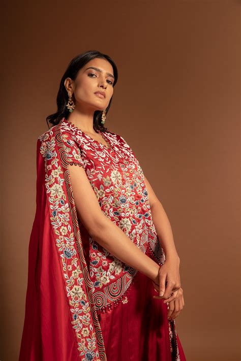 Red Lehenga and koti jacket with cape dupatta. – Sejal Kamdar Designs