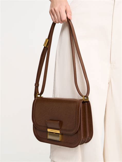 Dark Brown Charlot Bag | CHARLES & KEITH UK | Brown leather crossbody ...