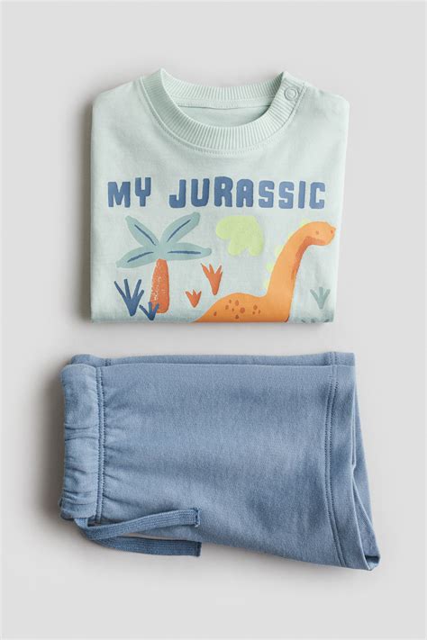 2-piece T-shirt and shorts set - Turquoise/Dinosaurs - Kids | H&M IN