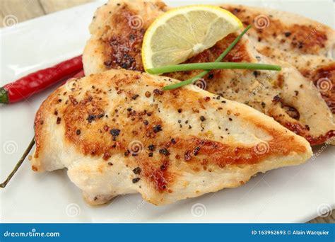 Grilled chicken cutlets stock image. Image of poultry - 163962693